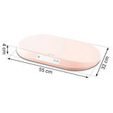 Rozā zīdaiņu svari Nukido ar izmēru bultiņām 55 cm un 32 cm, redzams arī 4 cm augstums