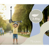 Bērns paceļ vieglo skrejriteni, redzams 3,8 kg svars