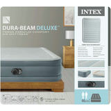 Intex Dura-Beam Deluxe piepūšamais matracis uz gultas ar iepakojumu un izmēra norādi 46 cm