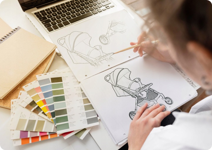 Nukido Paseo dizaina skice un materiālu paraugi pie darba galda