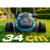 Humberg HM-612 priekšskats zālienā ar 34 cm pļaušanas platuma marķējumu