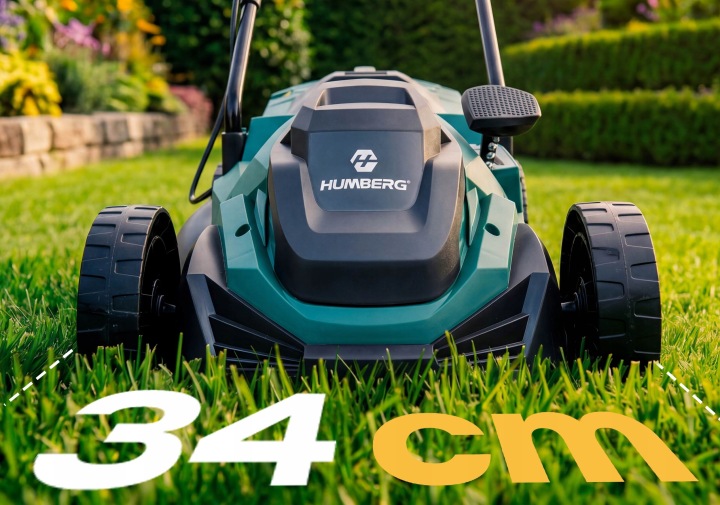 Humberg zāles pļaujmašīnas priekšskats zālienā ar 34 cm pļaušanas platuma marķējumu